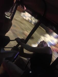 Jelisa caught me in action trying to catch some of the cool breeze! (No I am puking out the side of a tuk tuk!)